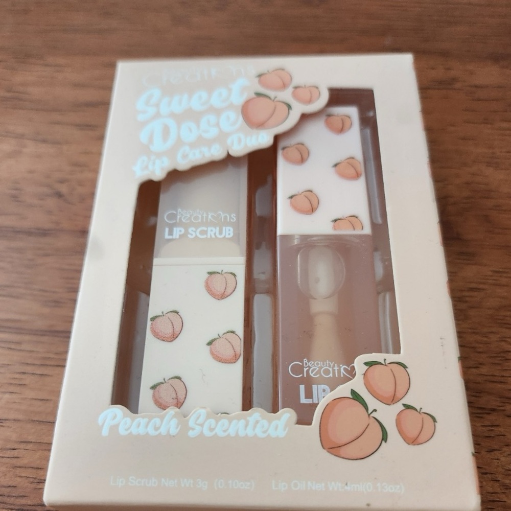 Brand New Lip Gloss & Lip Scrub Peach Scented.
